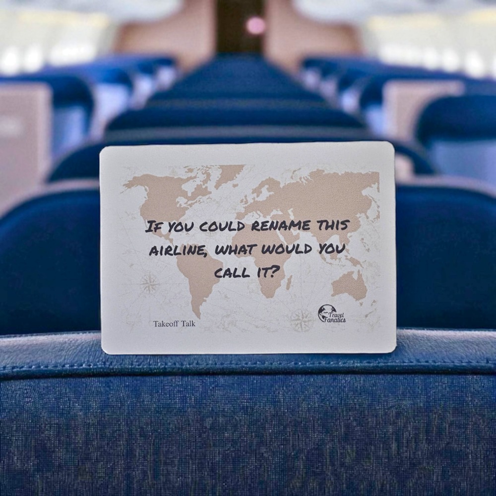 World map card on an airplane seat with a question about renaming the airline.