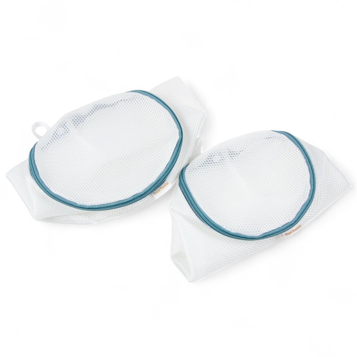 Two white mesh bags with blue edges on a white background