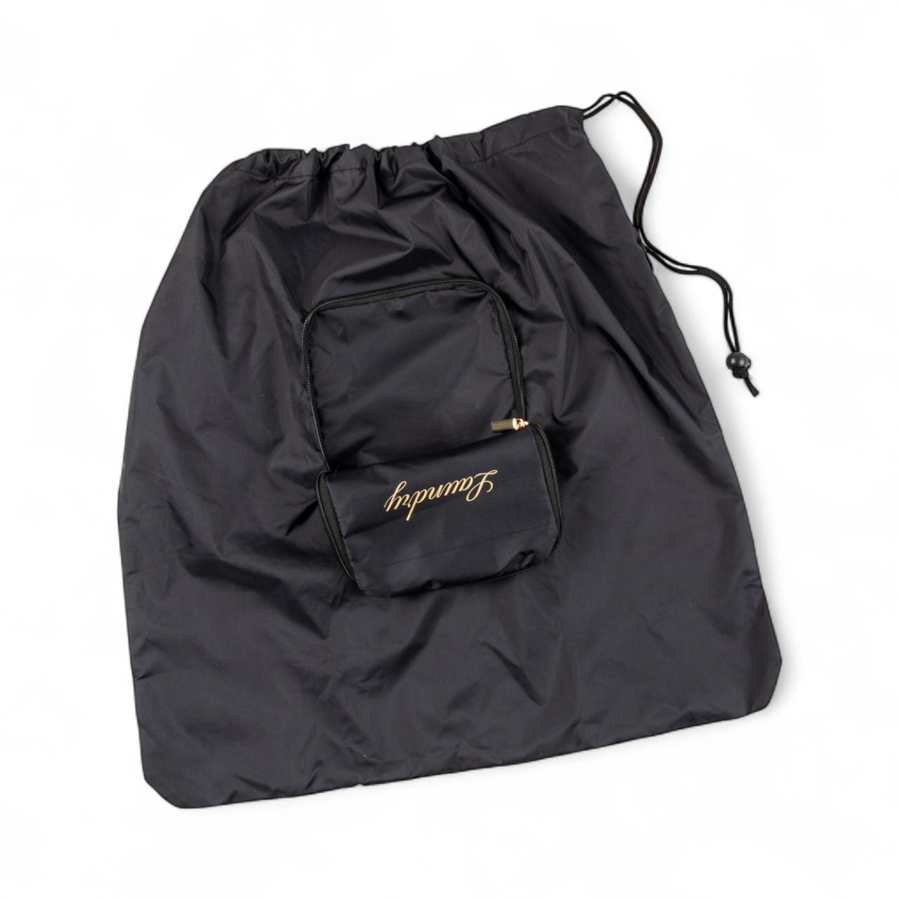Black drawstring bag with a smaller black pouch featuring gold text on a white background