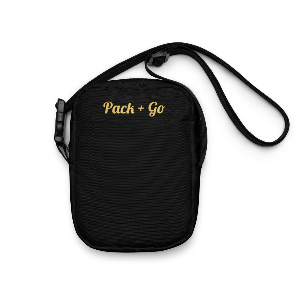 Black crossbody bag with 'Pack + Go' text on a white background