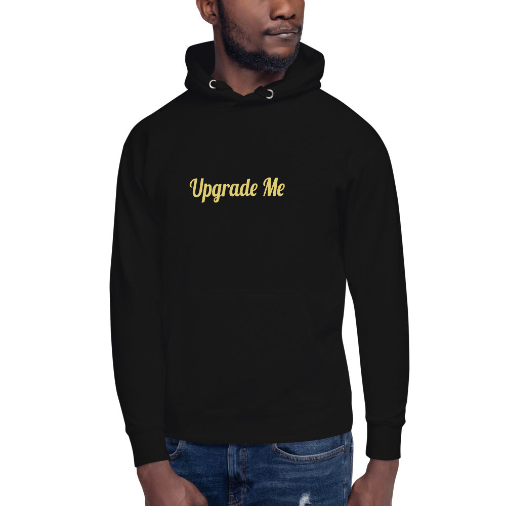Black hoodie with 'Upgrade Me' text on a white background