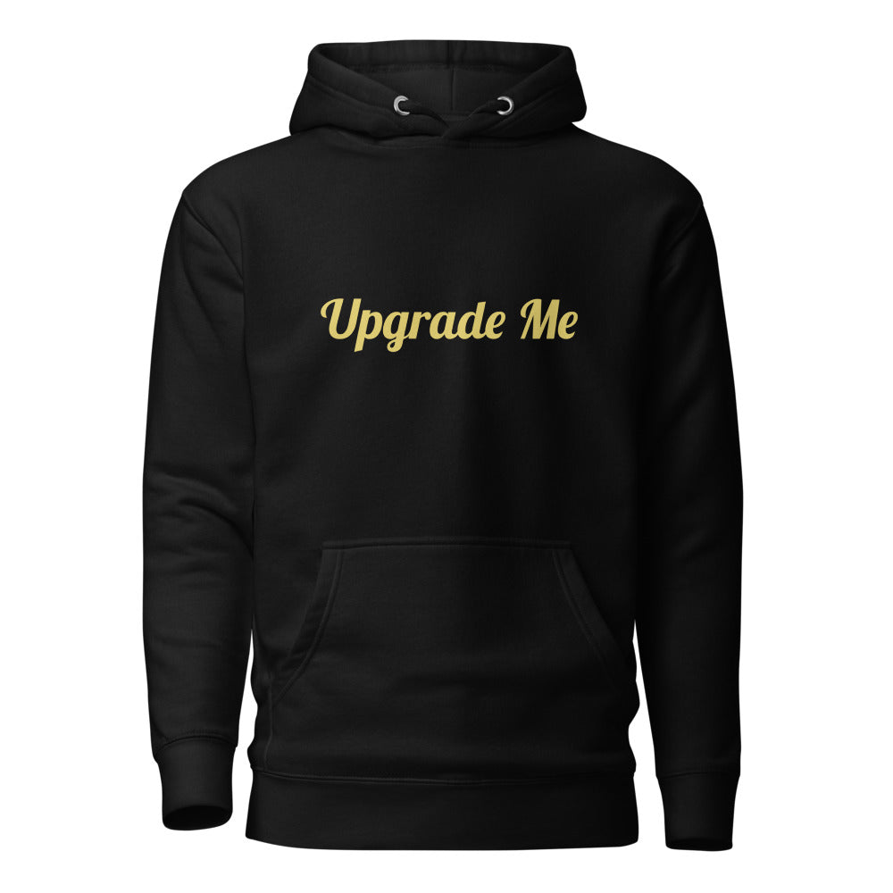 Black hoodie with 'Upgrade Me' text in gold on a white background