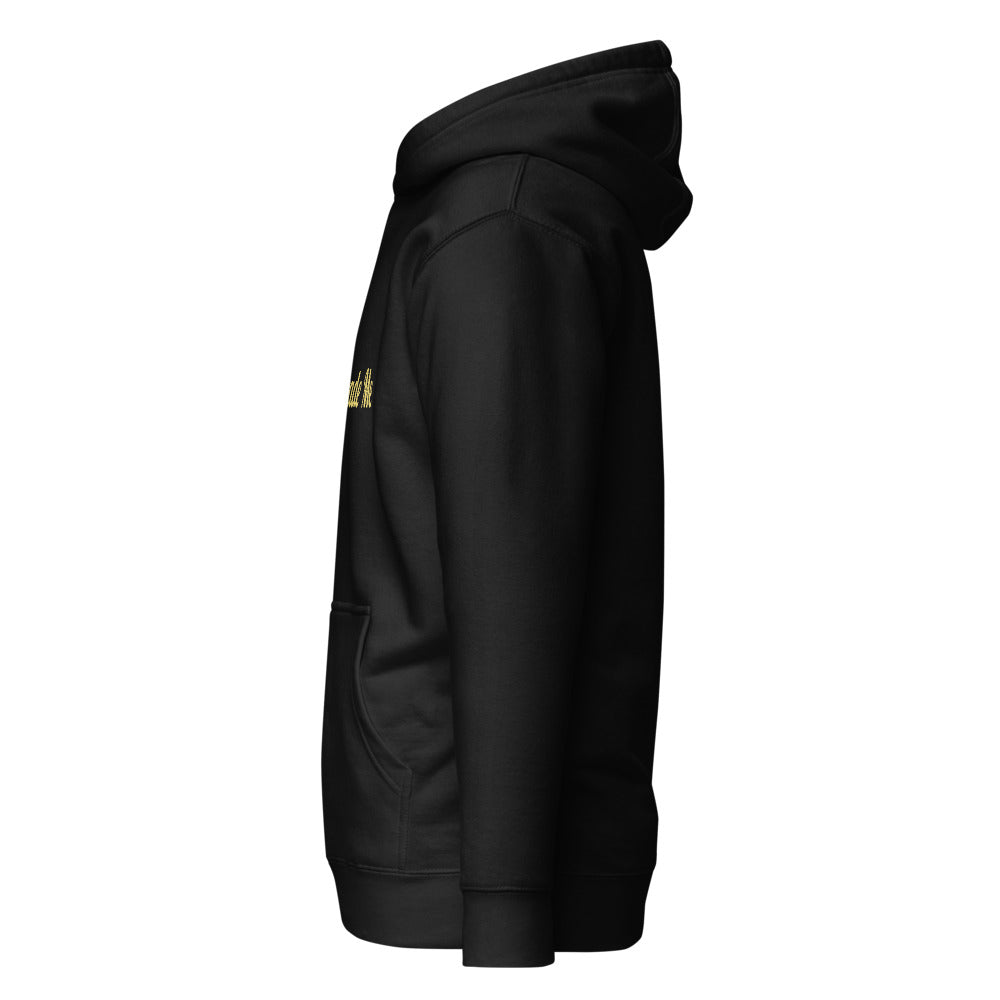 Black hoodie with a small yellow logo on the chest against a white background
