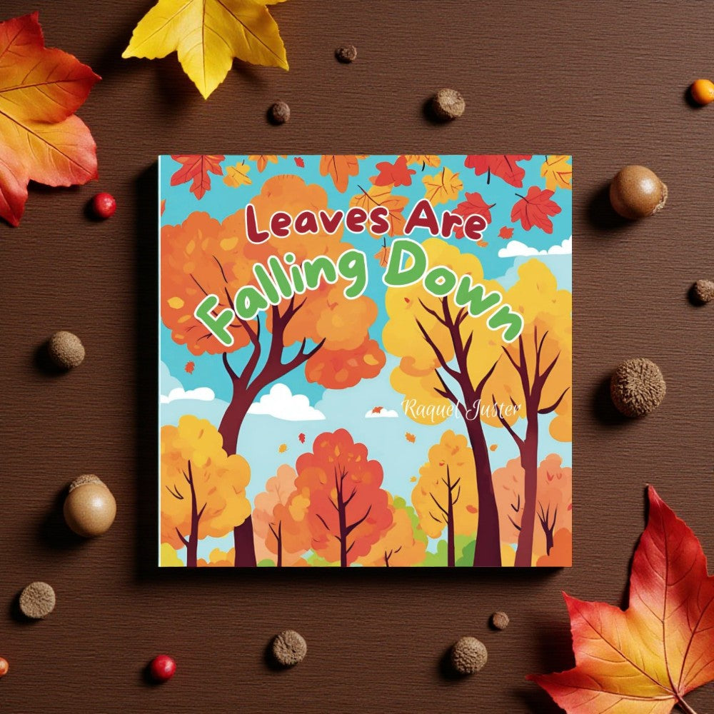 Children's book titled 'Leaves Are Falling Down' on a wooden surface with autumn leaves and nuts.