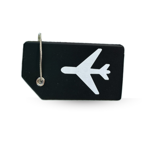 Silicone luggage tag in turquoise green and blue black shown on suitcases, easy to identify at baggage claim.