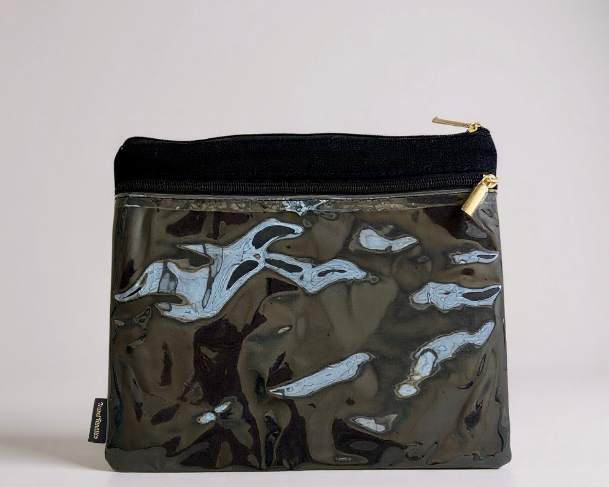 Black pouch with camouflage pattern on a light gray background