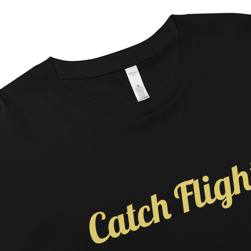 Black t-shirt with 'Catch Flight' text in gold on a white background