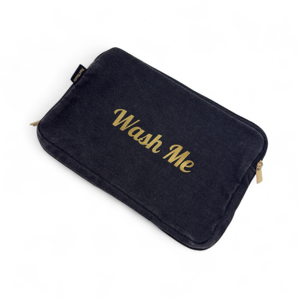 Black pouch with 'Wash Me' text on a white background


