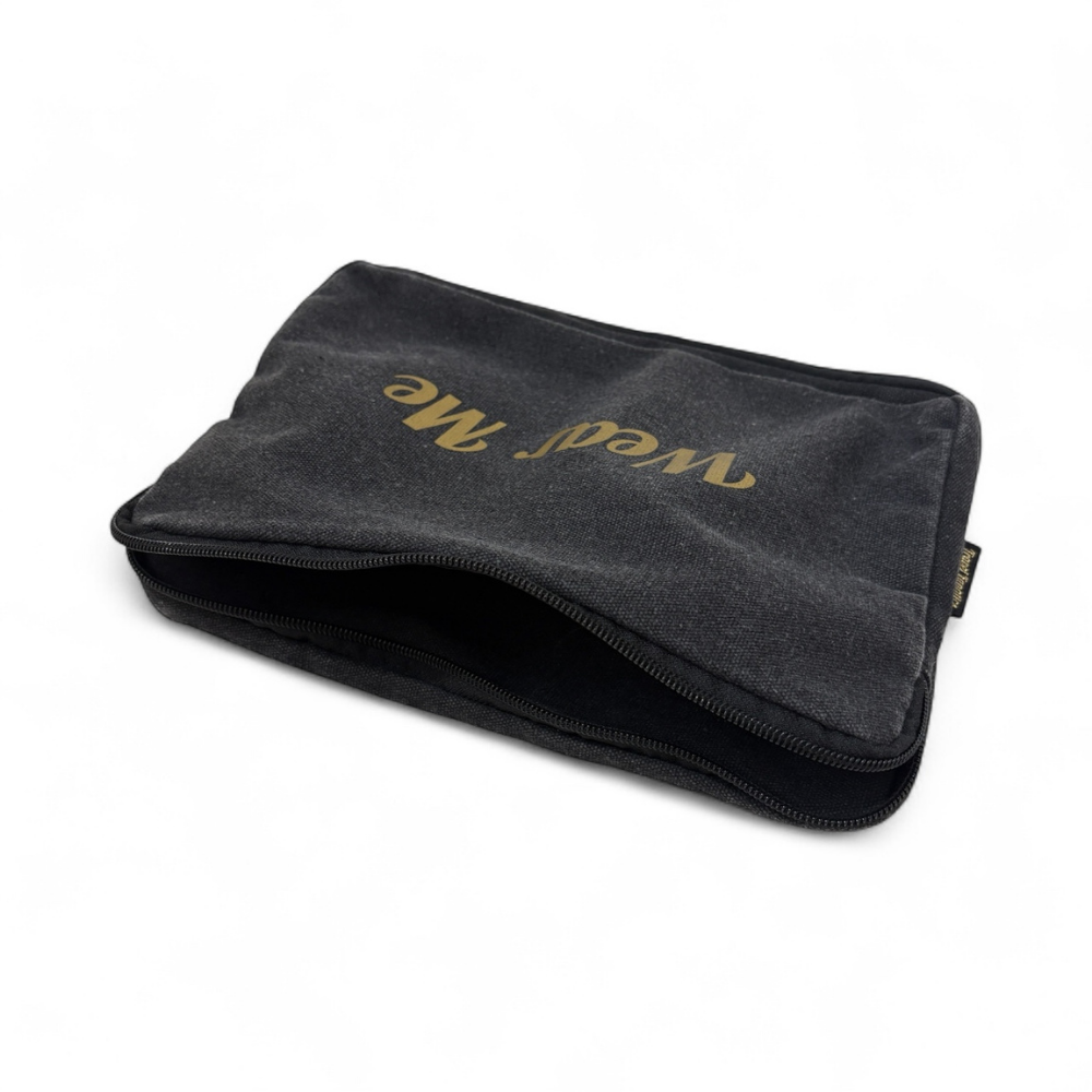 Black pouch with 'Wear Me' text on a white background

