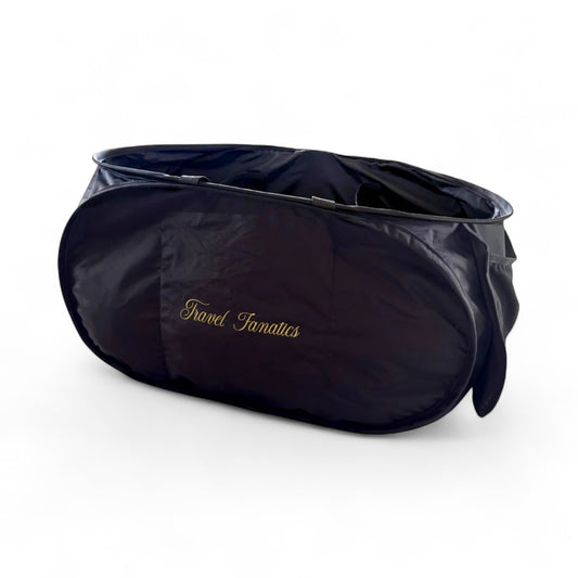 Black pet carrier with 'Travel Funnies' branding on a white background

