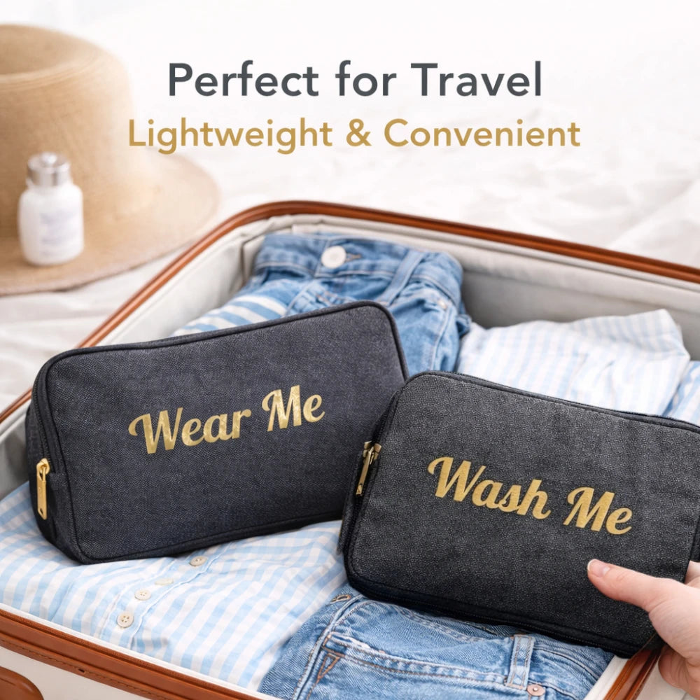 Pair of charcoal gray travel laundry bags closed and neatly styled with gold zipper accents
