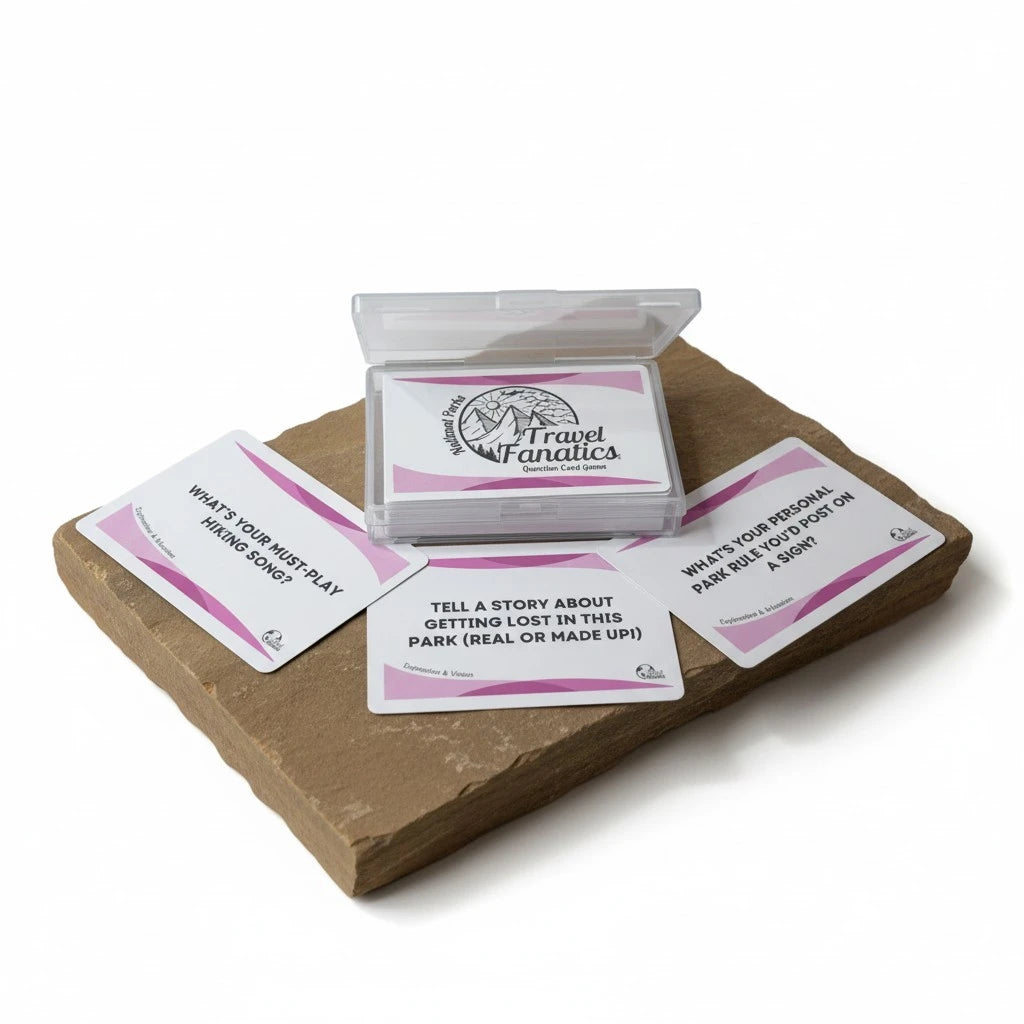 Set of travel-themed question cards on a stone surface with 'Travel Fanatics' packaging.

