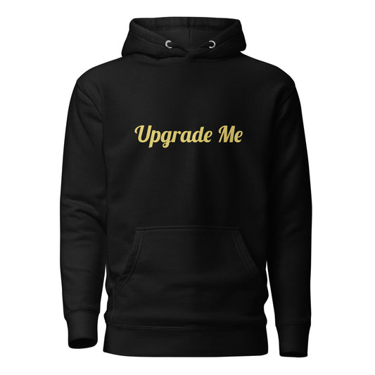 Black hoodie with 'Upgrade Me' text in gold on a white background

