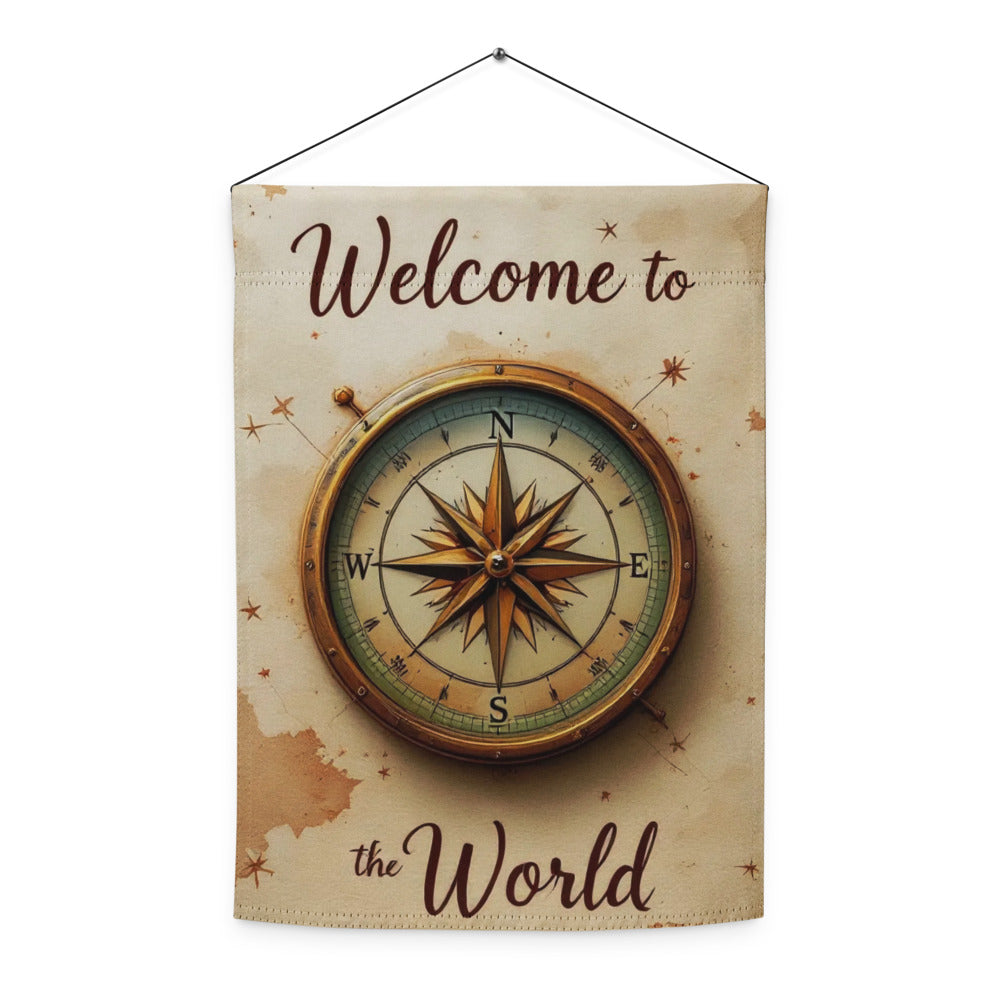 Decorative sign with compass design and 'Welcome to the World' text on a beige background.