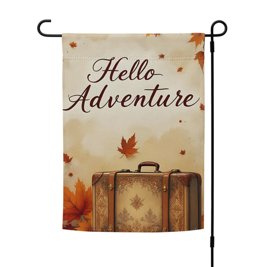 Decorative flag with 'Hello Adventure' text and vintage suitcase design, featuring autumn leaves.

