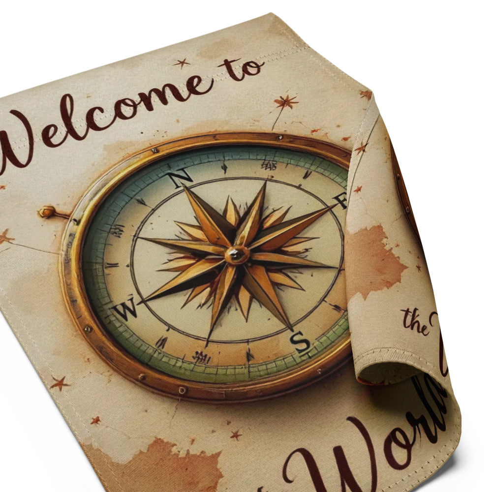 Decorative mat with a compass design and 'Welcome to the World' text on a beige background