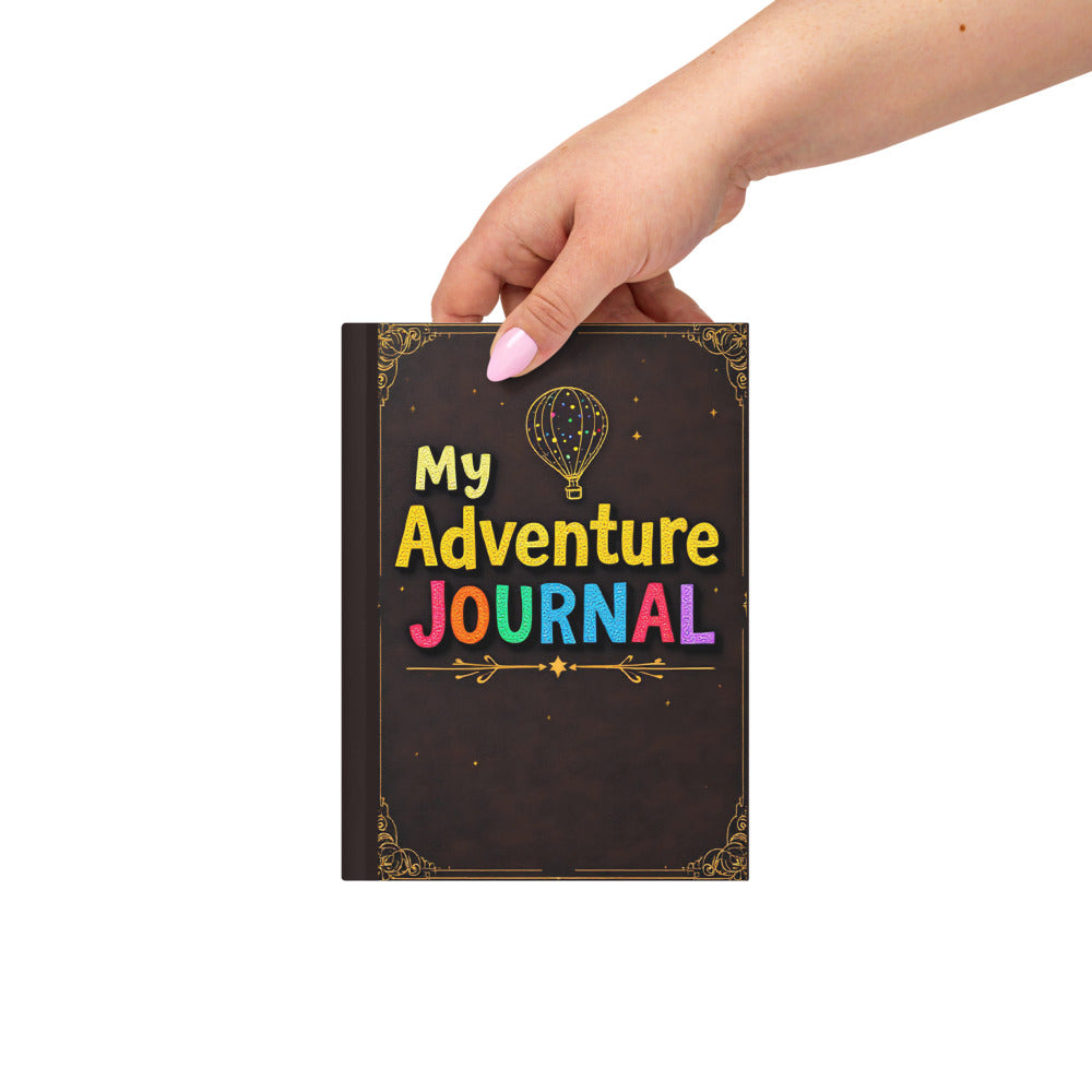 Hand holding a journal with 'My Adventure Journal' text on a white background

