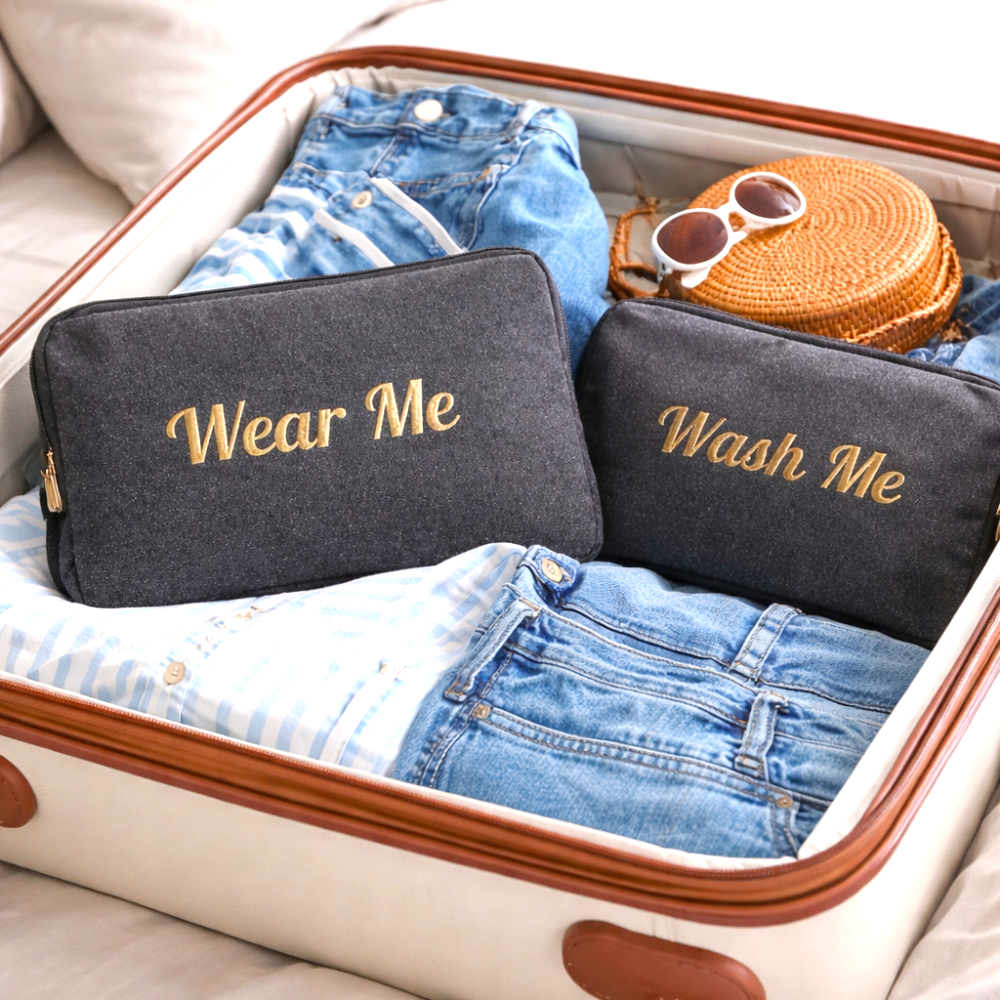 Open travel laundry pouch showing soft lined interior with wide zipper opening for easy packing and access