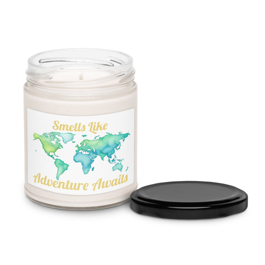 Candle jar with a world map design and text 'Smells Like Adventure Awaits' on a white background.