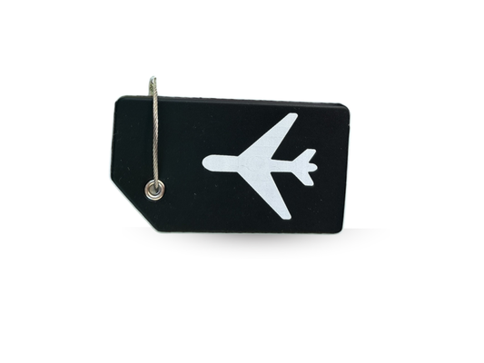 black luggage tag with white airplane