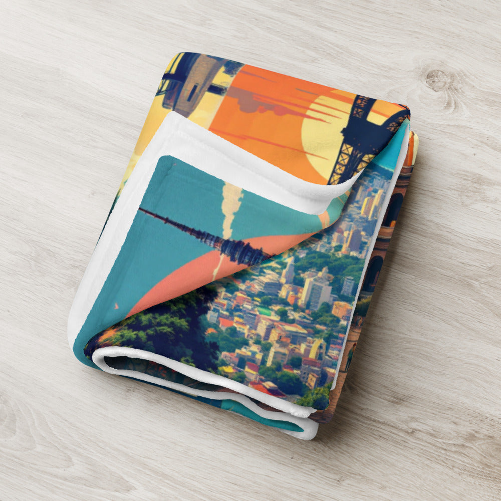 Colorful blanket with cityscape design on a light wooden surface

